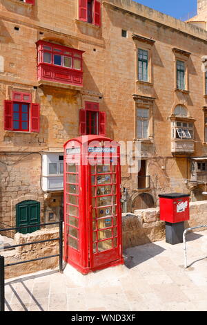 A Red Telephone Box in Valletta,Malta. Stock Photo