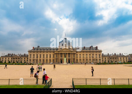 Lovely view of people standing in front of the École Militaire, a military school in the 7th arrondissement of Paris, France, southeast of the Champ... Stock Photo