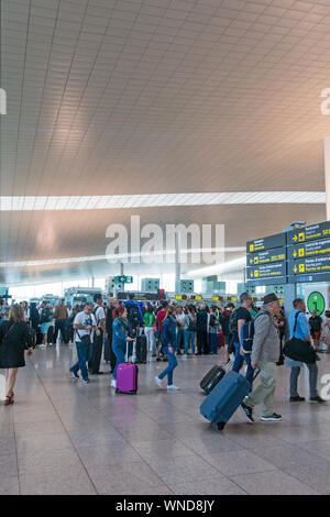 BARCELONA - JUNE 6, 2019: passenger embarking on the interior of Prat Airport in Barcelona, Spain. Since 2013, El Prat-Barcelona is the busiest airpor Stock Photo