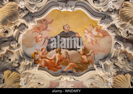 COMO, ITALY - MAY 10, 2015: The baroque fresco of St. Nicholas of Tolentino  in side nave of church Chiesa di San Agostino by Morazzone from 16. cent. Stock Photo