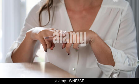 Close UpOf Woman Having Conversation At Home Using Sign Language