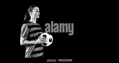 Tough female soccer player Stock Photo