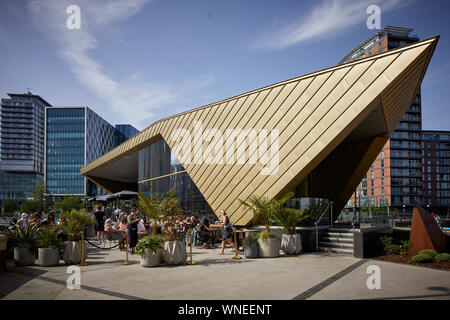 The Alchemist Salford Quays Media City alongside the historic Manchester Ship Canal Stock Photo