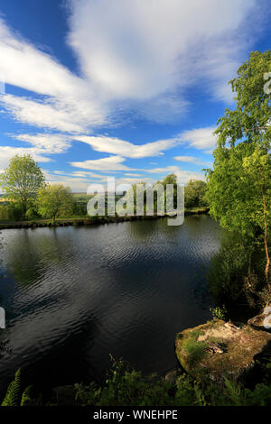 View over Ilkley Moor Tarn, above the town of Ilkley, West Yorkshire, England, UK Stock Photo