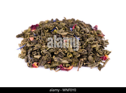 Green tea with dry flowers isolated on white background. Close up Stock Photo