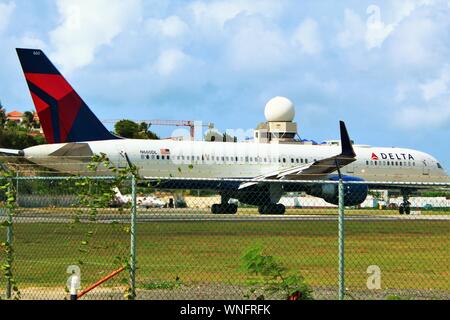 Princess Juliana International Airport, Sint Maarten - August 19th 2019: A Delta Air Lines Boeing 757 taxiing on the runway as it prepares to take off