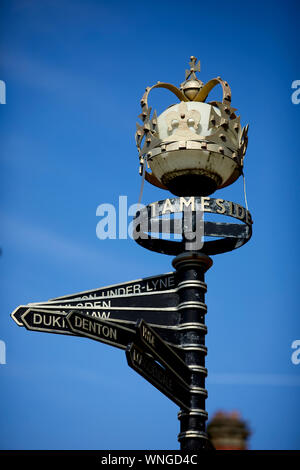 Tameside Stalybridge The 'Crown Pole' signpost erected in 2002, along with others in Tameside, to commemorate the golden jubilee of HM Queen Elizabeth Stock Photo