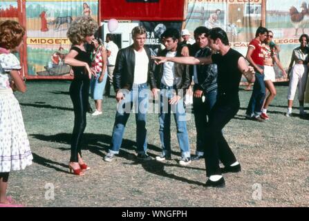 Grease  Year: 1978 USA Olivia Newton John, Kelly Ward, Barry Pearl, Michael Tucci, John Travolta  Director: Randal Kleiser Stock Photo