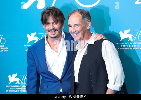 Venice, Italy. 6th Sep, 2019. Actors Johnny Depp (L) and Mark Rylance attend a photocall for the film 'Waiting for the Barbarians' at the 76th Venice Film Festival in Venice, Italy, Sept. 6, 2019. Credit: Zhang Cheng/Xinhua/Alamy Live News
