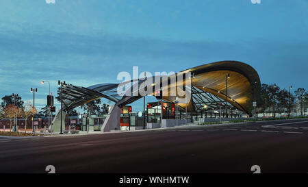 Station building street view. North West Metro Stations, Sydney, Australia. Architect: HASSELL, 2019. Stock Photo