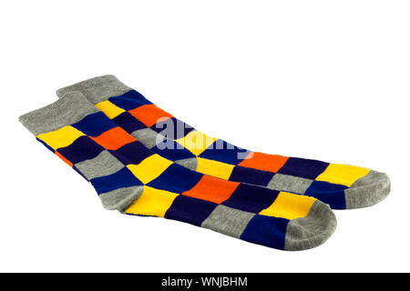 Multi-coloured checkered socks isolated against a white background Stock Photo