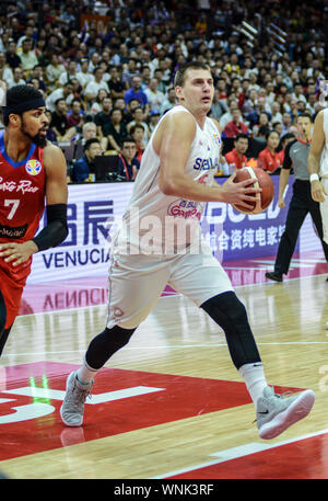 Nikola Jokic (Serbia Basketball National Team) scores against Puerto Rico. Basketball World Cup China 2019, second round Stock Photo