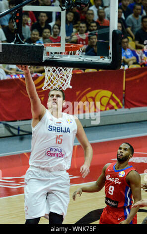 Nikola Jokic (Serbia Basketball National Team) scores against Puerto Rico. Basketball World Cup China 2019, second round Stock Photo