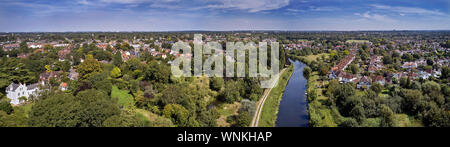 Panoramic view over East Molesey with River Mole and River Ember. City of London is middle of the horizon, with Wembley Stadium arch centre-left. Stock Photo