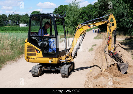 GERMANY, Plau, broadband cable works of german Telekom T-Com for fast internet in rural areas, a promotion program of  ministry of traffic and digital infrastructure from the german government Stock Photo