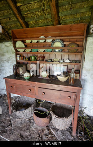 Welsh dresser on display in the Sheila's cottage museum a traditional Scottish black house on the Isle of Ulva, Isle of Mull, Inner Hebrides, Scotland Stock Photo