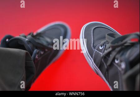 Canvas Shoes with Red background Stock Photo