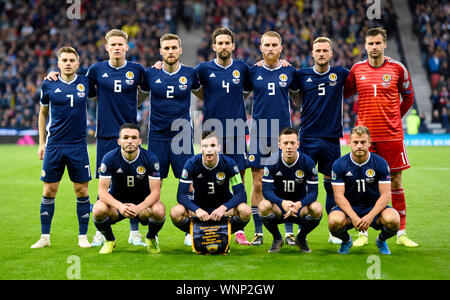 Scotland team group. Top row (left to right) Scotland's James Forrest, Scott McTominay, Stephen O'Donnell, Charlie Mulgrew, Oliver McBurnie, Liam Cooper and David Marshall. Bottom row (left to right) John McGinn, Andrew Robertson, Callum McGregor and Ryan Fraser during the UEFA Euro 2020 Qualifying, Group I match at Hampden Park, Glasgow. Stock Photo