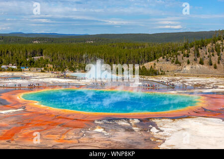 Grand Prismatic Spring, the largest hot spring at Yellowstone National Park, is 200-330 feet in diameter and more than 121 feet deep. Stock Photo