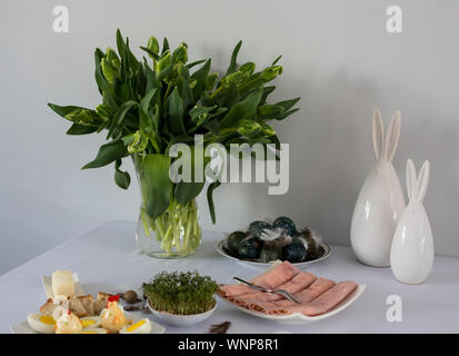 Traditional, polish Easter table with colored eggs, boiled eggs Stock Photo