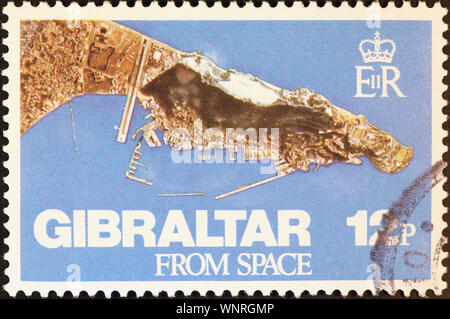 Gibraltar peninsula seen from space on postage stamp Stock Photo