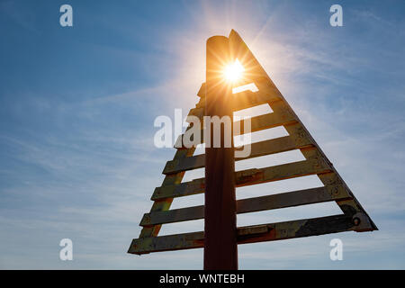 These Signs (German: Bake) on the Ellenbogen Beach mark the border between Germany and Denmark in the Wadden Sea. Stock Photo