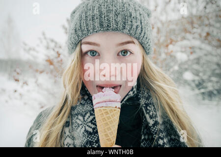 Beautiful girl eating ice cream Stock Photo