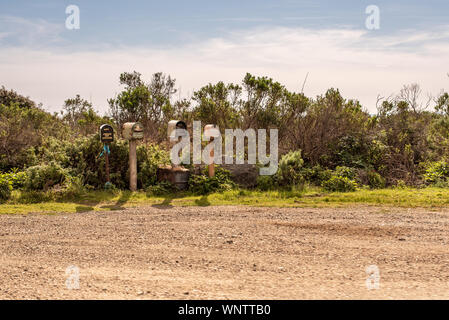 Antique mailboxes on US Highway 1 Stock Photo