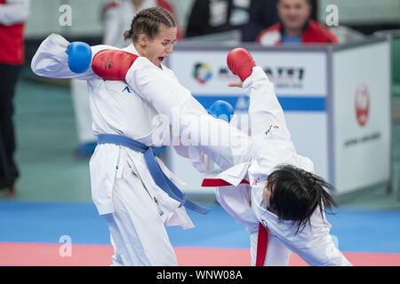 Tokyo, Japan. 6th Sep, 2019. Valeria Alekhina of Russia (blue) fights against Ruri Fujita of Japan (red) during the elimination round of Female Kumite's -55kg category at Karate1 Premier League Tokyo 2019. The Karate1 Premier League is held from September 6 to 8 at the Nippon Budokan. The KarateÂ will make its debut appearanceÂ at the Tokyo 2020 Summer Olympic Games. Ruri Fujita won the bout. Credit: Rodrigo Reyes Marin/ZUMA Wire/Alamy Live News Stock Photo