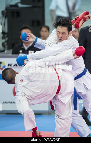 Tokyo, Japan. 6th Sep, 2019. Dionysios Xenos of Greece (red) fights against Hiroto Gomyo of Japan (blue) during the elimination round of Male Kumite's -67kg category at Karate1 Premier League Tokyo 2019. The Karate1 Premier League is held from September 6 to 8 at the Nippon Budokan. The KarateÂ will make its debut appearanceÂ at the Tokyo 2020 Summer Olympic Games. Hiroto Gomyo won the bout. Credit: Rodrigo Reyes Marin/ZUMA Wire/Alamy Live News Stock Photo