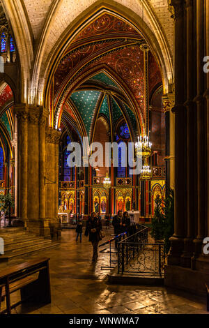 Tourist visiting the beautifully decorated apse of the Cathedral Sainte-Marie in Bayonne. Bayonne, France, January 2019 Stock Photo