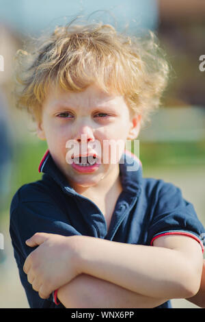 Portrait of young boy craying Stock Photo