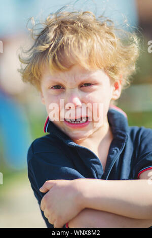 Portrait of young boy craying Stock Photo