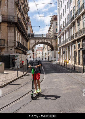 Ordinary life in the old district of Istanbul. two guys are riding along a  narrow street on one electric scooter. Turkey , Istanbul - 21.07.2020 Stock  Photo - Alamy