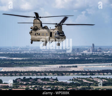 OPA-LOCKA, FLORIDA , FLORIDA (4 September 2019) -- Florida National Guard Soldiers and Airmen, from the CBRN Enhanced Response Force Package (CERFP), load equipment and prepare for potential missions responding to Hurricane Dorian. (Photo by Ching Oettel) Stock Photo