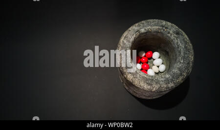 grinding tool with wihite and red candys Stock Photo