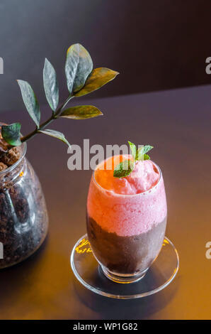 Chocolate and strawberry smoothie on table in resturant bar. Stock Photo