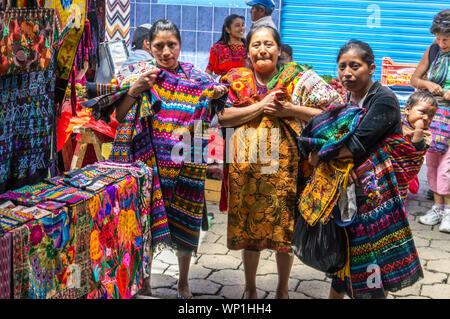 Mayan Women Sell Textiles to Tourists at the Street Market in Chichicastenango, Guatemala