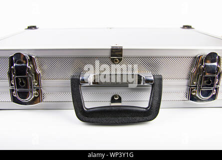 Aluminum case for a working tool on a white background, free space for dext Stock Photo