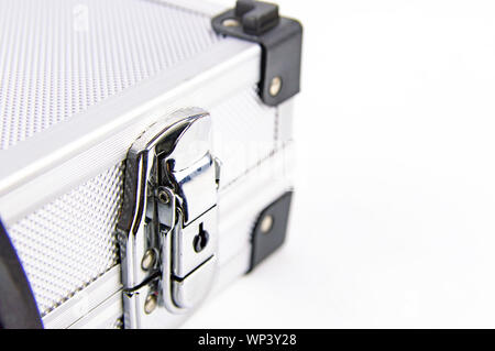 Aluminum case for a working tool on a white background, free space for dext Stock Photo