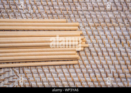 Retro paper straws on a straw background Stock Photo
