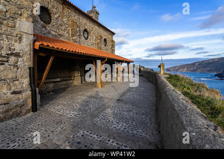 The hermitage of San Juan de Gaztelugatxe on the top of the islet, Bermeo, Basque Country, Spain Stock Photo