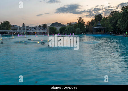 PLOVDIV, BULGARIA - AUGUST 25, 2019: Sunset view of Singing Fountains at Tsar Simeon Garden in City of Plovdiv, Bulgaria Stock Photo