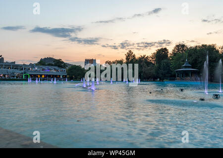 PLOVDIV, BULGARIA - AUGUST 25, 2019: Sunset view of Singing Fountains at Tsar Simeon Garden in City of Plovdiv, Bulgaria Stock Photo