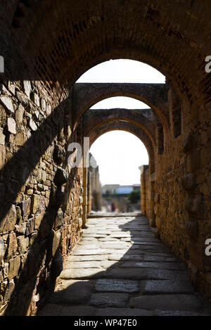 Narrow entrance into the Roman theatre of Merida in south Spain Stock Photo