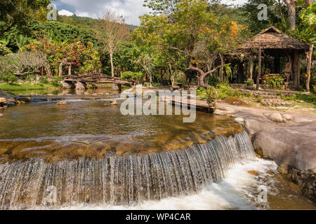 Water stream running over the artificial cascades Stock Photo