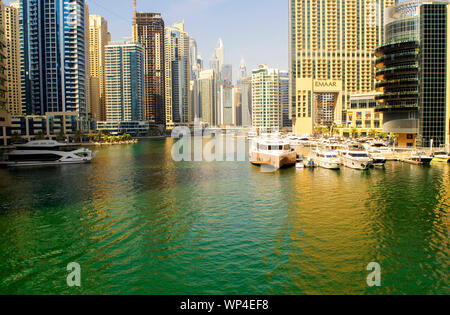 Dubai / UAE - September 6, 2019: View on Dubai Marina luxury touristic district with skyscrapers and lagoon with yachts. Stock Photo