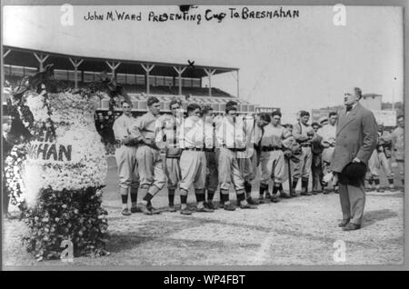 John Montgomery Ward presenting cup to Roger Bresnahan before New York NL players (baseball) Stock Photo