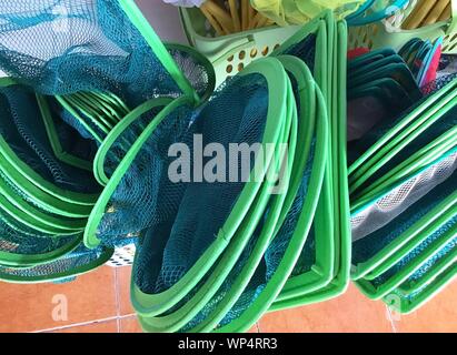 A hand net for scooping fish in fish farm Stock Photo - Alamy