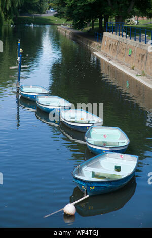 Rowing boats on canal Stock Photo